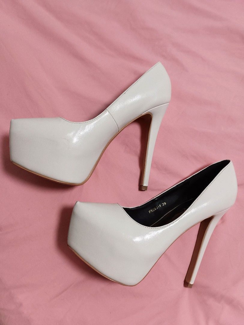 White shop platform pumps