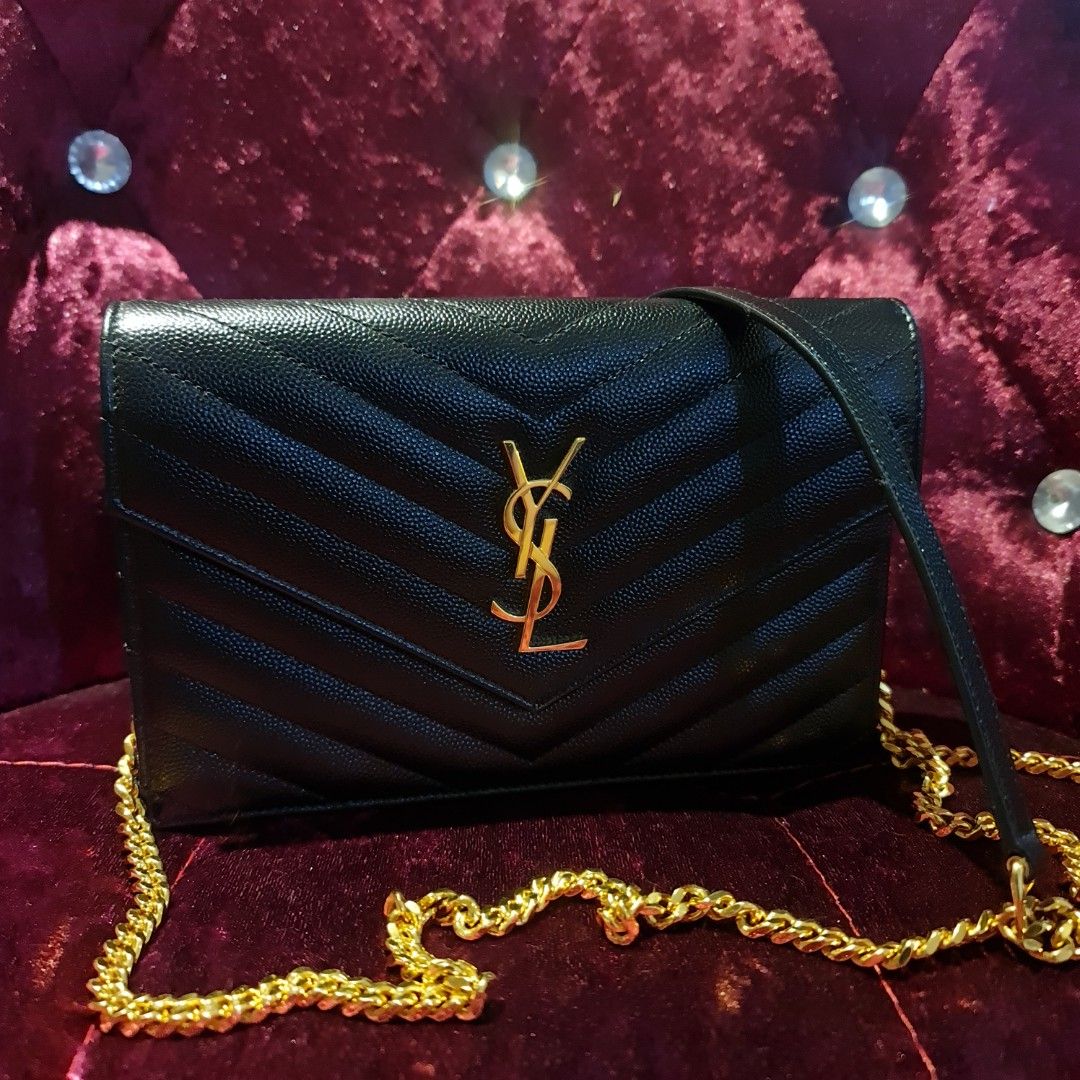 YSL woc black with gold hardware, Luxury, Bags & Wallets on Carousell