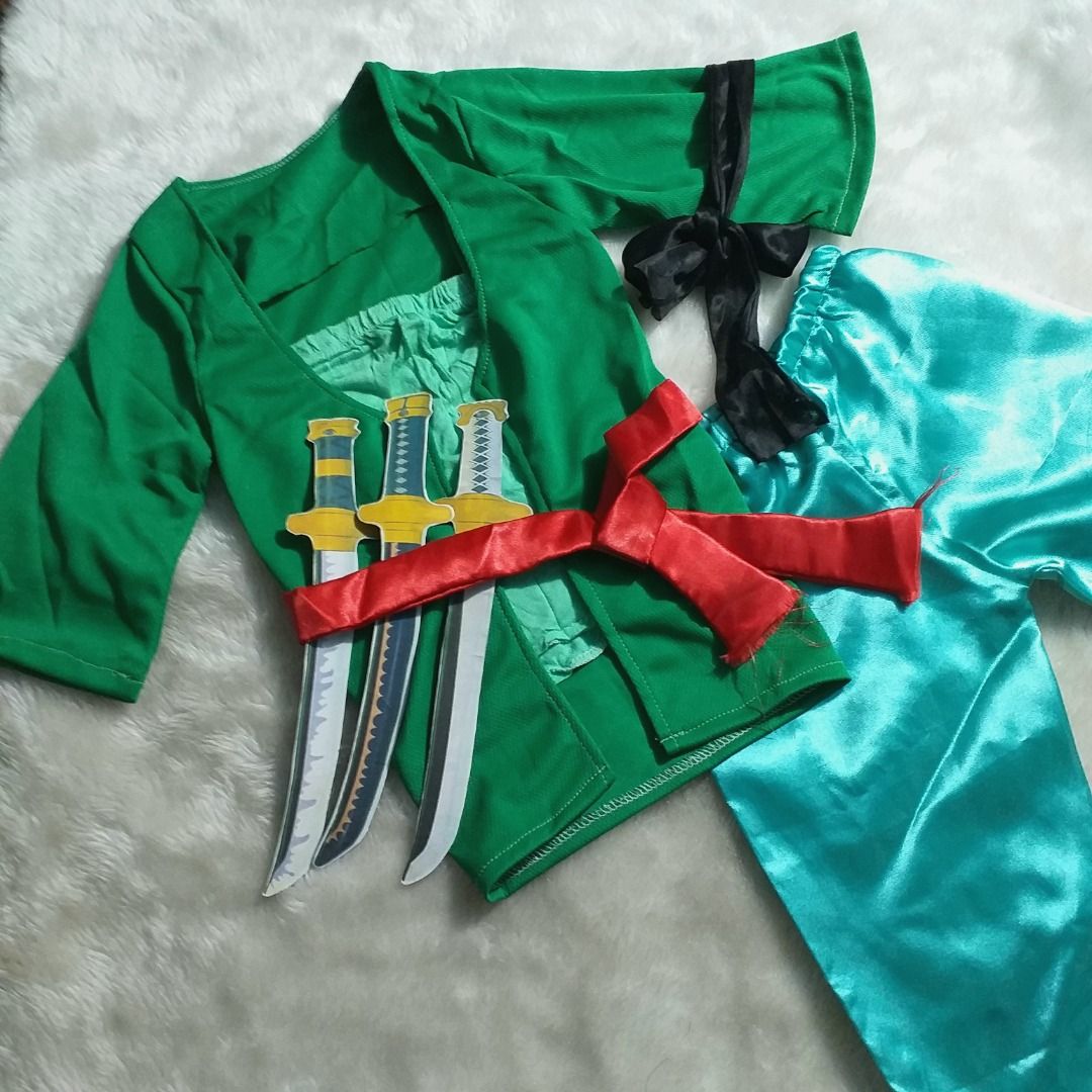 Zoro (OnePiece) Costume (Category: Babies & Kids Fashion) located in Taytay. Submitted by khrizzashop (Listing ID 1263758809, Image 2). Description: Pre-Loved - Costume for my baby Boy😊 Little Zoro OnePiece @2 months old Used: Only Once lang po sa Pictorial lang nagamit (Tahi pa ito ng Mother In Law ko) Size is 2mos but can fit up to 4mos (Depend on the size of the baby) Payment: Gcash & Bank Transfer Courier: J&T and Lalamove shoulder by the bu