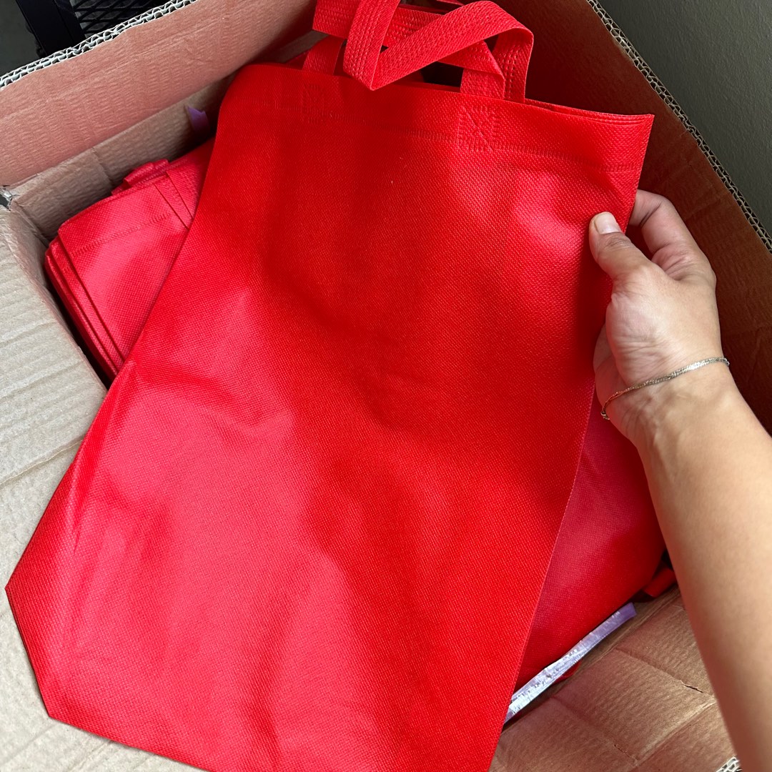 Red non woven bag on sale