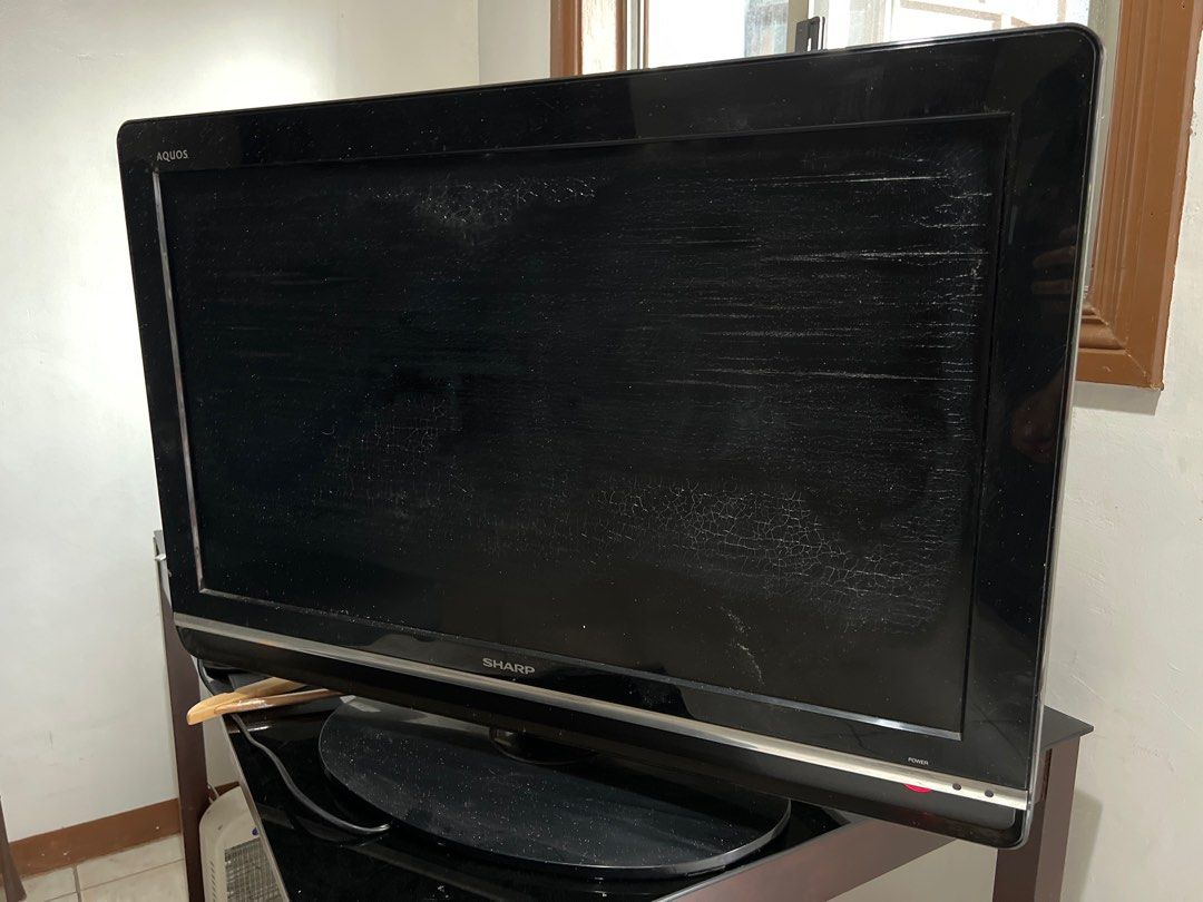 31” Sharp Aquos TV (Category: TV) located in Taguig. Submitted by r_m_g (Listing ID 1263977096, Image 2). Description: Unit is still working LED screen shows cracks from the humid weather and for not being used RFS: Decluttering .