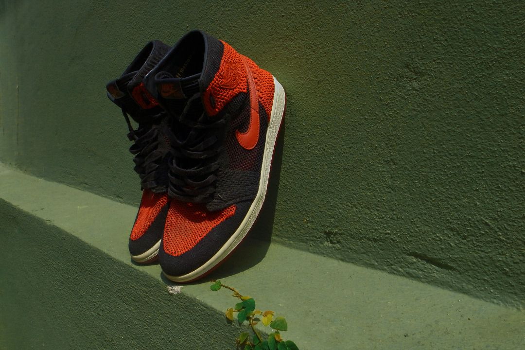 AJ 1 Bred Flyknit Men s Fashion Footwear Sneakers on Carousell