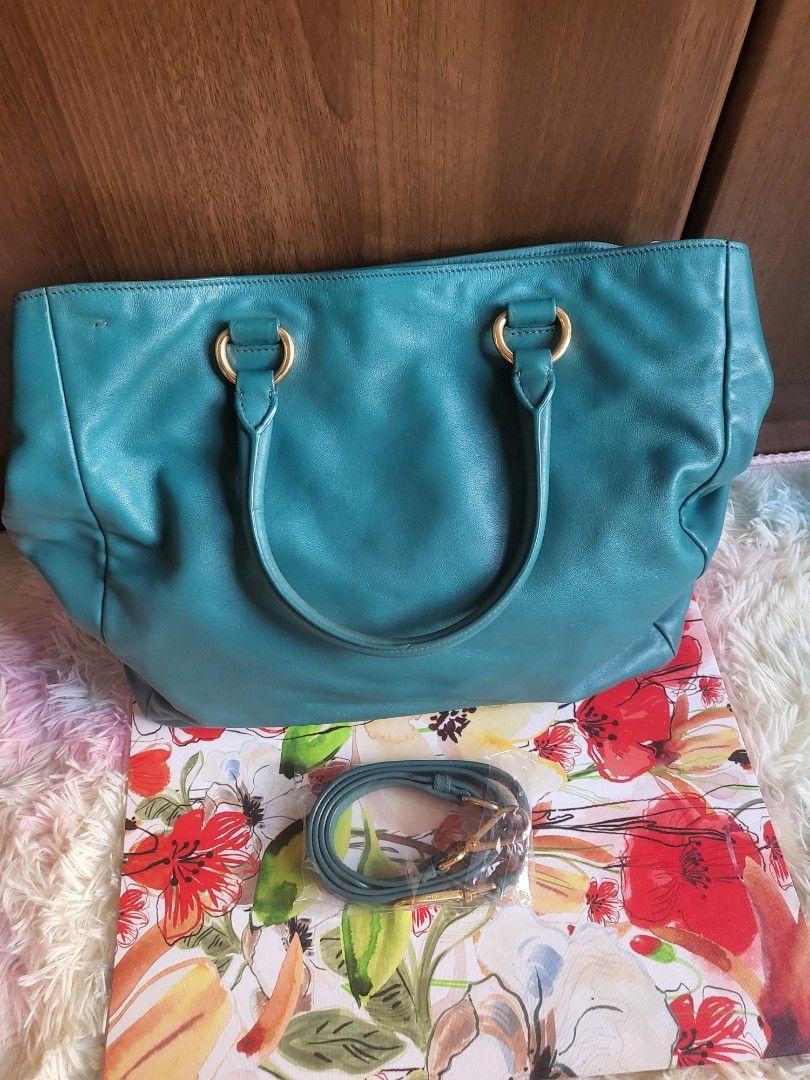 Authentic Prada Vitello Daino 2-Way Bag (Category: Luxury Bags & Wallets) located in Rizal. Submitted by SummerPeaCloset (Listing ID 1264053955, Image 2). Description: Authentic Prada Vitello Diano 2-Way 💼 With original long strap and provided dustbag selling low rank 8/10 Dm only if you’re a serious buyer. No chat mates and time wasters, please. (Pass sa kwentuhan) .