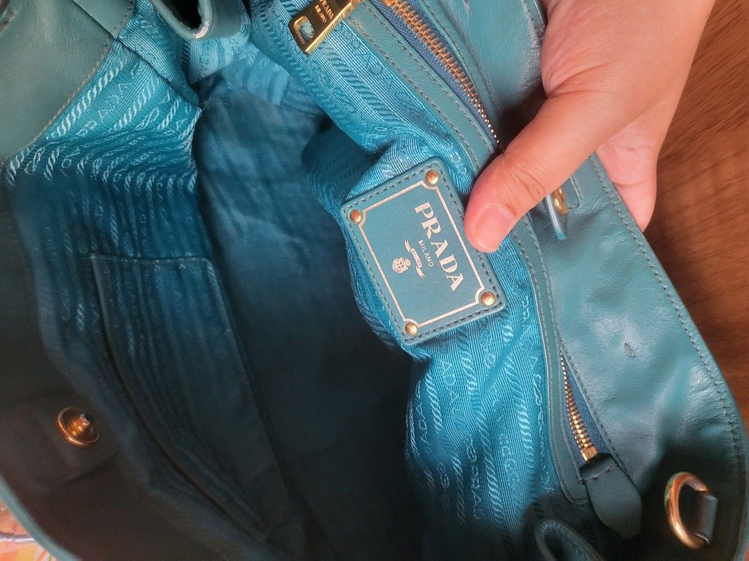 Authentic Prada Vitello Daino 2-Way Bag (Category: Luxury Bags & Wallets) located in Rizal. Submitted by SummerPeaCloset (Listing ID 1264053955, Image 3). Description: Authentic Prada Vitello Diano 2-Way 💼 With original long strap and provided dustbag selling low rank 8/10 Dm only if you’re a serious buyer. No chat mates and time wasters, please. (Pass sa kwentuhan) .