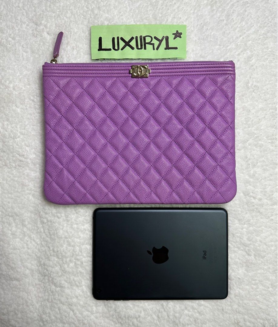 •CHANEL Authentic Purple BOY Leather Clutch Bag (Category: Luxury Bags & Wallets) located in Dasmarinas. Submitted by luxuryl (Listing ID 1264071675, Image 3). Description: •CHANEL Authentic Purple BOY Leather Clutch Bag. (Preloved) Very Good Condition 9.5/10 Intact Hologram with Authenticity Card✅ Negotiable ❗️ 100% Original/Authentic. Money back guarantee if proven fake! 📍We do meet up within Metro Manila/Cavite area.🤝 📍For other provinces w