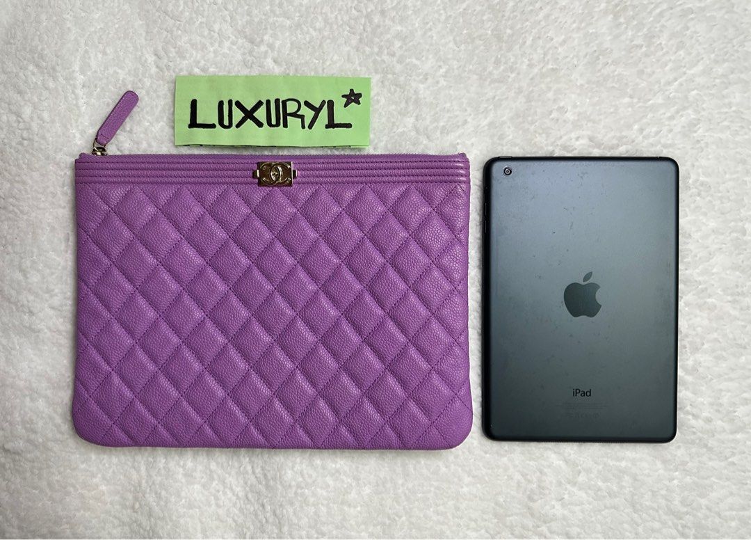 •CHANEL Authentic Purple BOY Leather Clutch Bag (Category: Luxury Bags & Wallets) located in Dasmarinas. Submitted by luxuryl (Listing ID 1264071675, Image 2). Description: •CHANEL Authentic Purple BOY Leather Clutch Bag. (Preloved) Very Good Condition 9.5/10 Intact Hologram with Authenticity Card✅ Negotiable ❗️ 100% Original/Authentic. Money back guarantee if proven fake! 📍We do meet up within Metro Manila/Cavite area.🤝 📍For other provinces w