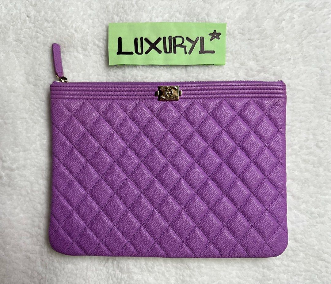 •CHANEL Authentic Purple BOY Leather Clutch Bag (Category: Luxury Bags & Wallets) located in Dasmarinas. Submitted by luxuryl (Listing ID 1264071675, Image 1). Description: •CHANEL Authentic Purple BOY Leather Clutch Bag. (Preloved) Very Good Condition 9.5/10 Intact Hologram with Authenticity Card✅ Negotiable ❗️ 100% Original/Authentic. Money back guarantee if proven fake! 📍We do meet up within Metro Manila/Cavite area.🤝 📍For other provinces w