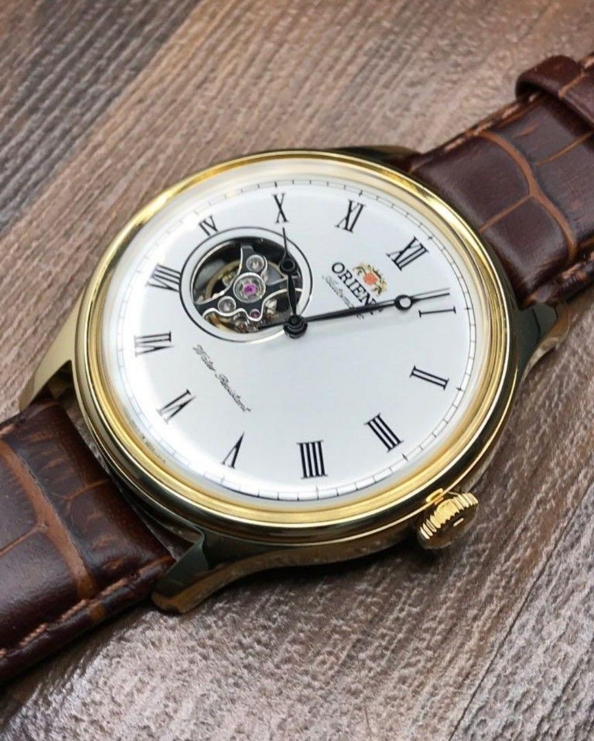 White dial analog watch top