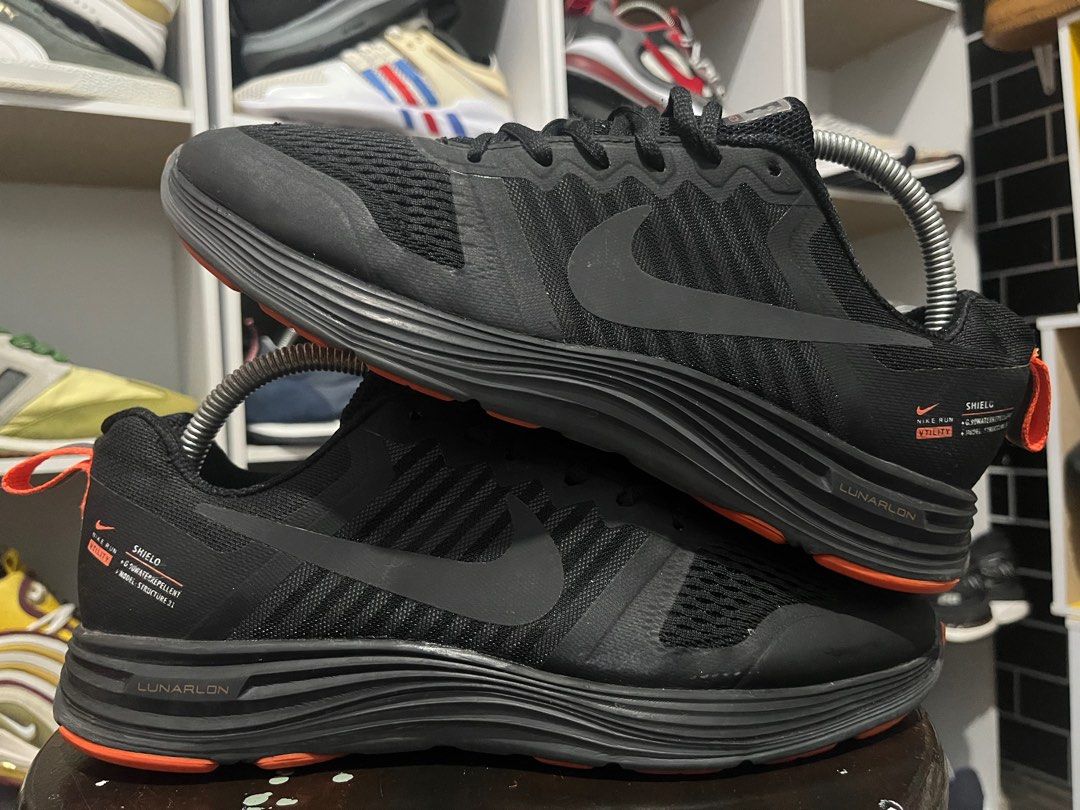 Nike outlet shield structure