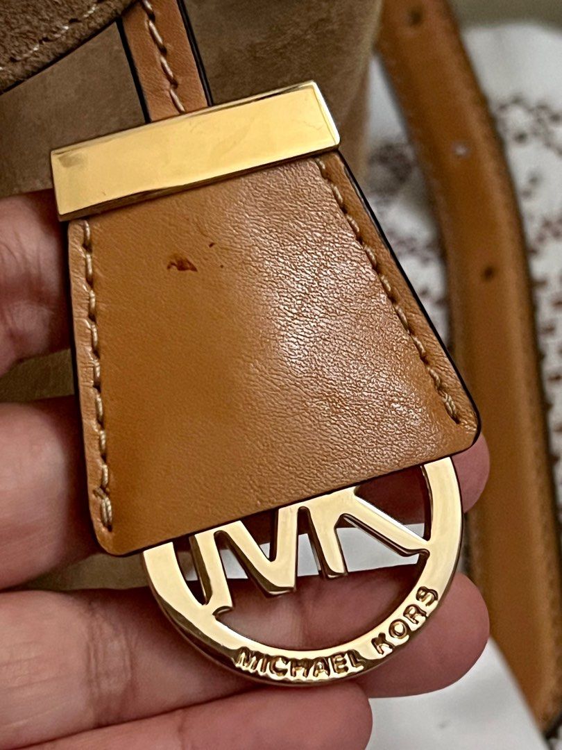 Original Michael Kors Romy Medium Suede Backpack not Dooney Coach (Category: Luxury Bags & Wallets) located in Cavite. Submitted by Junells_Nook (Listing ID 1263988567, Image 3). Description: Sobrang elegant in actual! Original, used only once Comes with the MK dust bag, card and paper bag (paper bag is slightly damaged though) A structured style that boasts chic contemporary appeal. Crafted from sumptuous suede, it features an elegant fold-over 