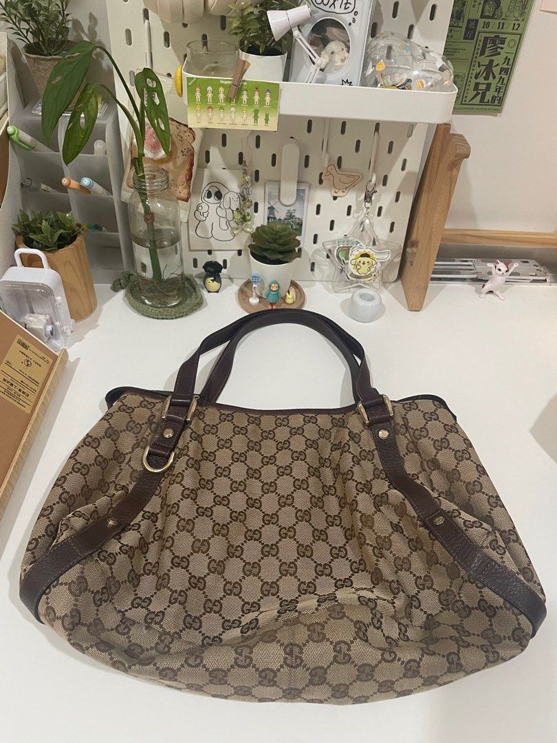 Lowest price gucci best sale bag