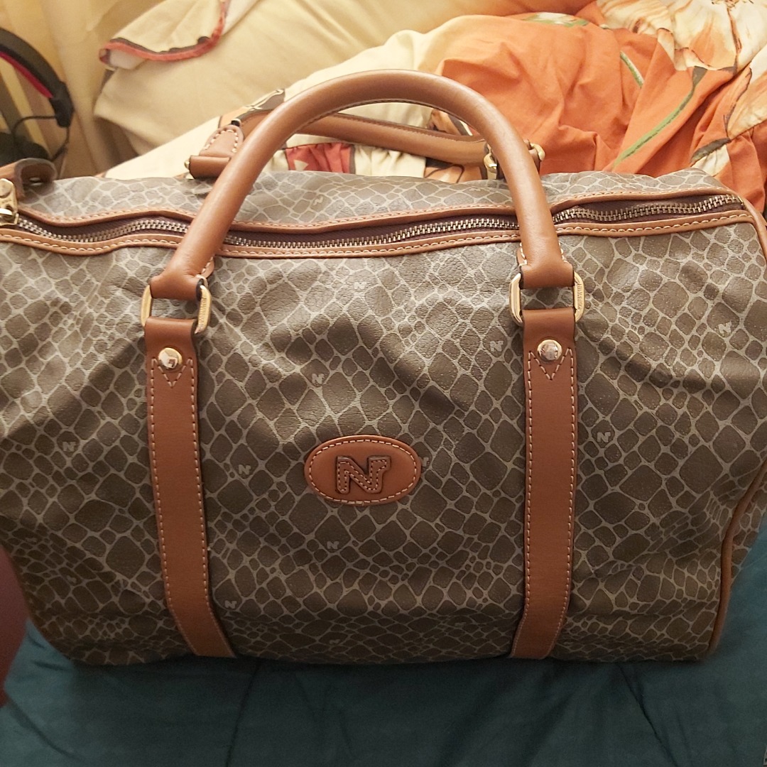 Preloved Nina Ricci Travel Bag from Japan