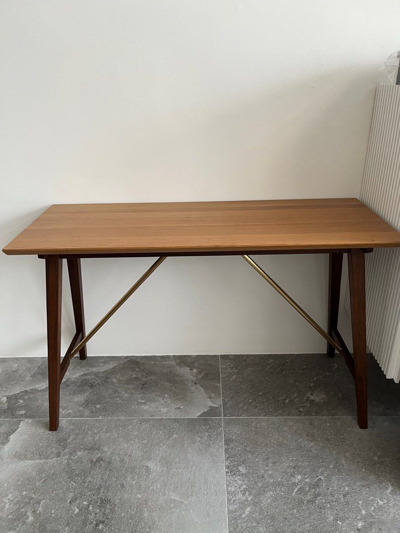 Side table (Category: Tables & Sets) located in Singapore. Submitted by sze-hui (Listing ID 1263959132, Image 1). Description: Duo tone side table by Commune, oak top and walnut legs. Used lightly as display counter and kept in very good condition. No scratches. Purchased in 2020 for $899 Please arrange own transport for pick up from Tanjong Pagar area..