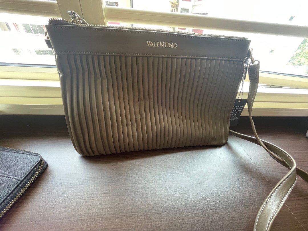 Fringe valentino clearance clutch bag