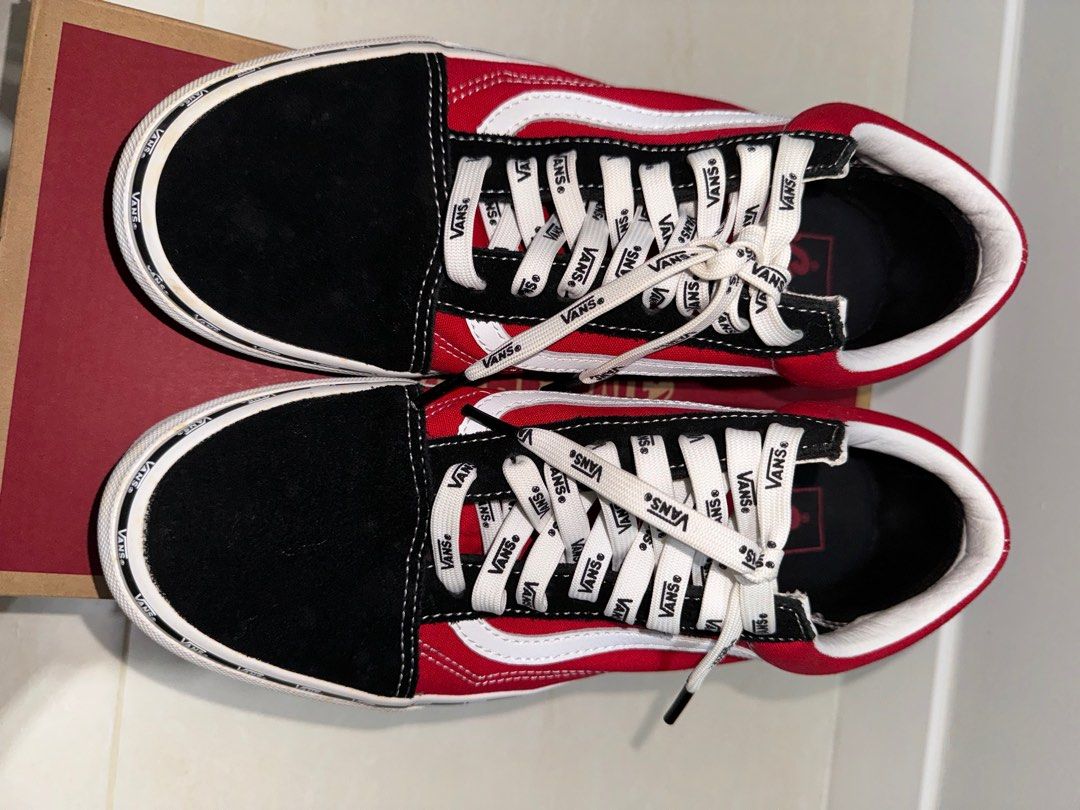 Red and black shop off the wall vans