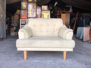 2 seater fabric sofa  49L x 30W x 17 1/2H inches 38 1/2 inches sandalan height In good condition Code akc 956