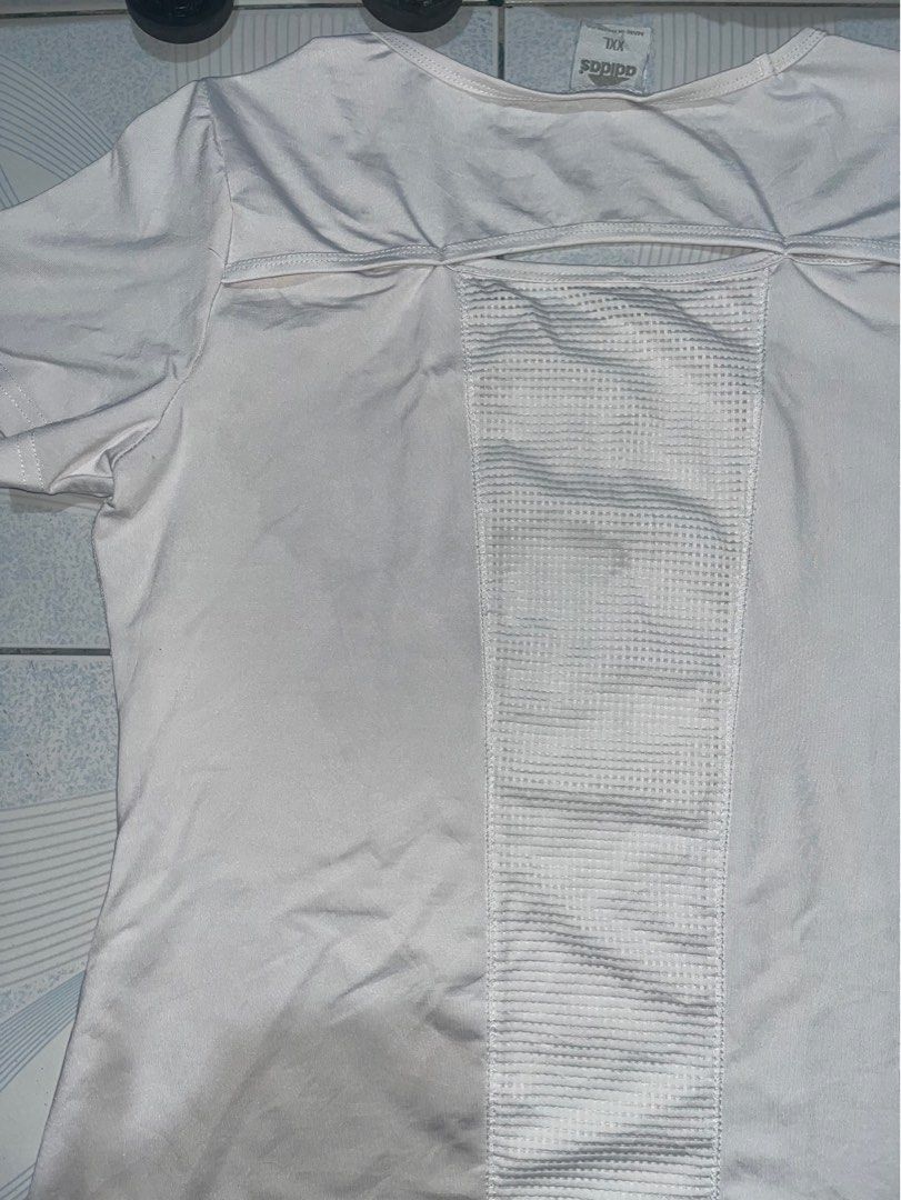 ADIDAS White Mesh Activewear Top (Category: Activewear) located in Magalang. Submitted by mtgons (Listing ID 1264116654, Image 3). Description: ADIDAS White Mesh Top - XXL on tag, but fits XXS, XS, S - Barely used, like new - Good for working out as it has a mesh feature on the back - Authentic adidas, price is negotiable.