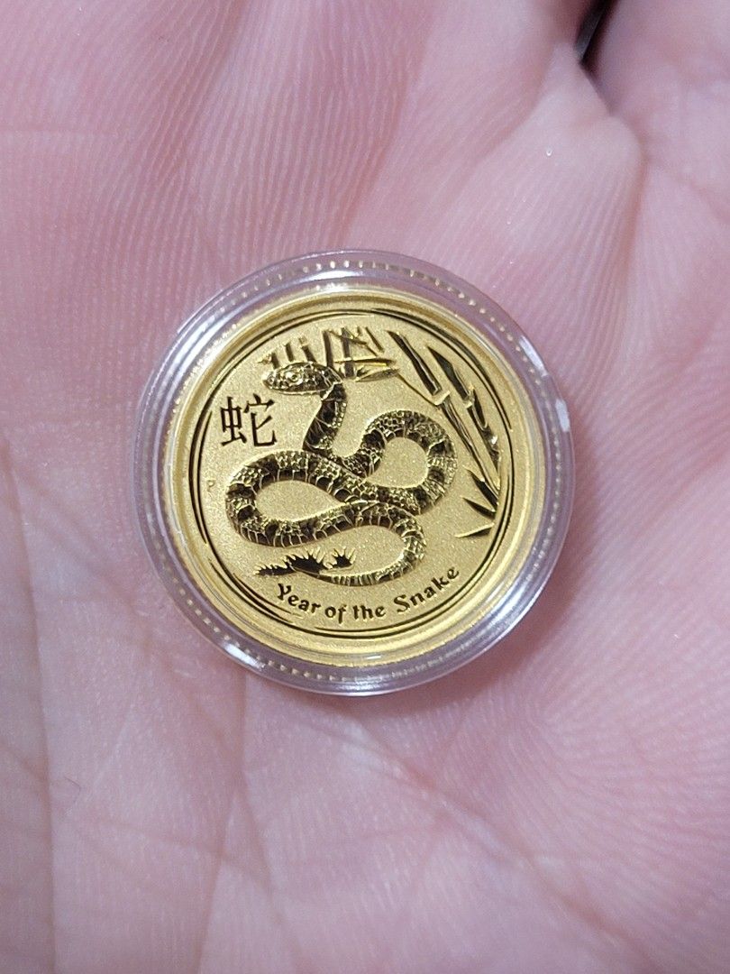 Australia Perth Mint Lunar Series II Year of the Snake 2013 Gold Coin 1/10oz (Category: Currency) located in Singapore. Submitted by mini_mini_miao_93 (Listing ID 1264211775, Image 1). Description: 1/10oz, 3.11gm, with original capsule. Super rare, great as a gift and collection..