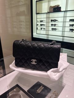 Authentic BN Chanel small classic flap in black caviar leather
