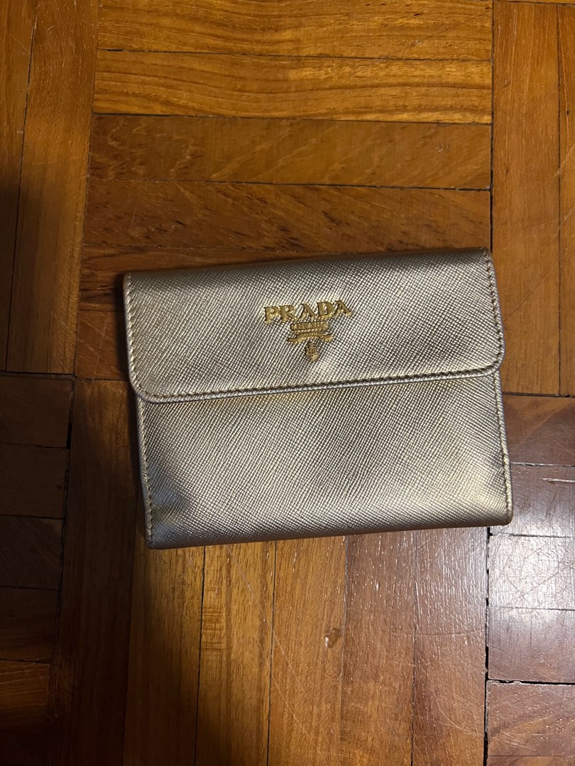 Leather wallet Prada Gold in Leather - 34018136