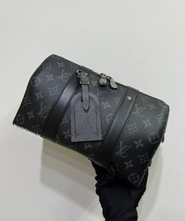 Louis Vuitton City Keepall in black leather ref.404485 - Joli Closet