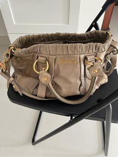 Miu Miu Bow mini bag, Luxury, Bags & Wallets on Carousell