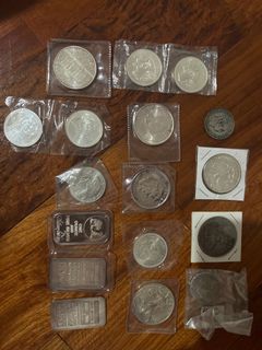 Set of silver coins and silver bars