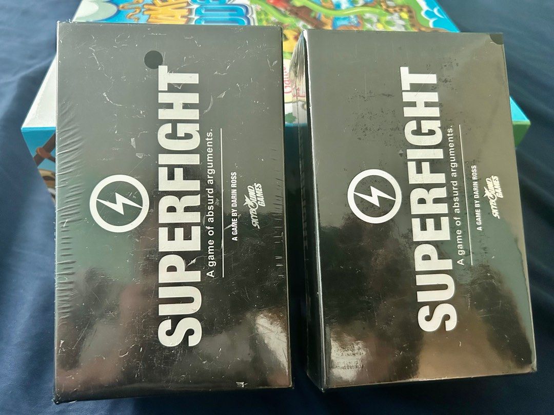 SuperFight Card Game (Category: Board Games & Puzzles) located in Manila. Submitted by cozzyessentialshopph (Listing ID 1264148148, Image 1). Description: Item: SuperFight Card Game Family and Friends Game 7years old and up Price: P599.00 About the product: 🌟 Superfight Card Game——The rules and about 30% of the cards were refined to improve the game after it sold out of the first five prints in preorders alone. The game is now produced by the fo