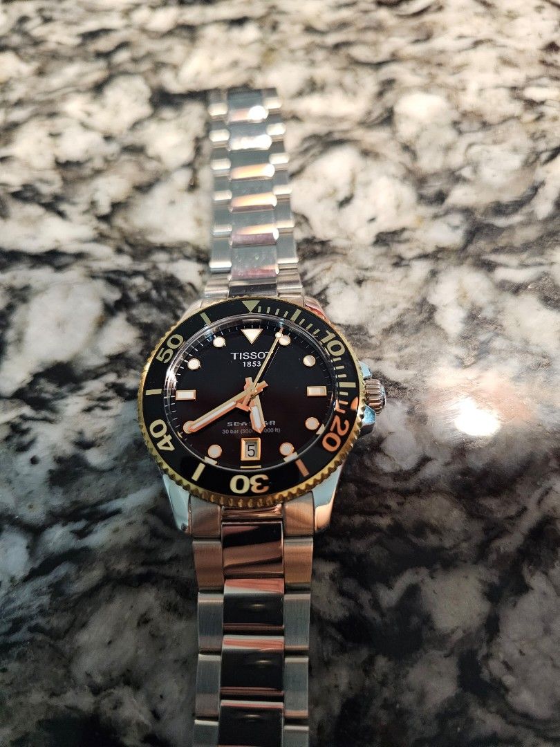 Tissot seastar 1000 gold store