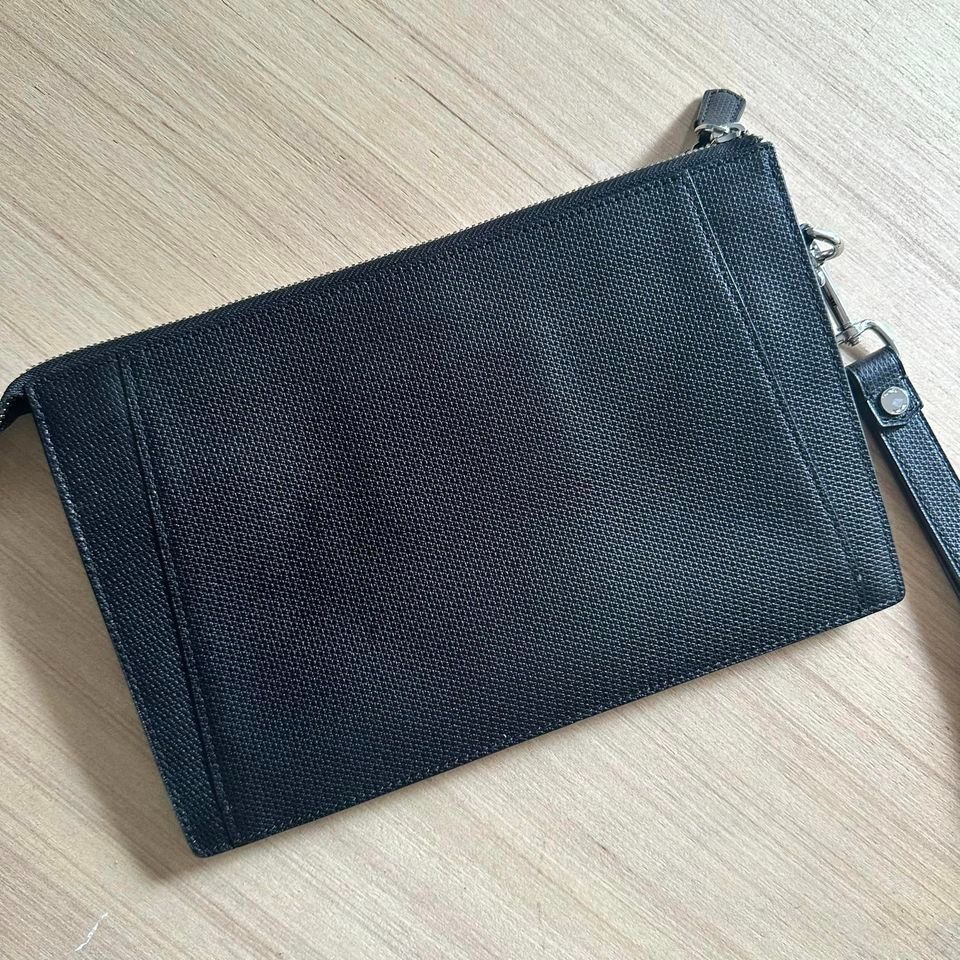 Tumi double sale zip clutch