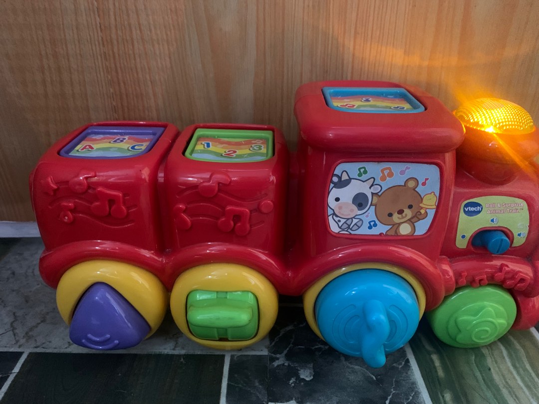 Vtech roll and shop surprise animal train