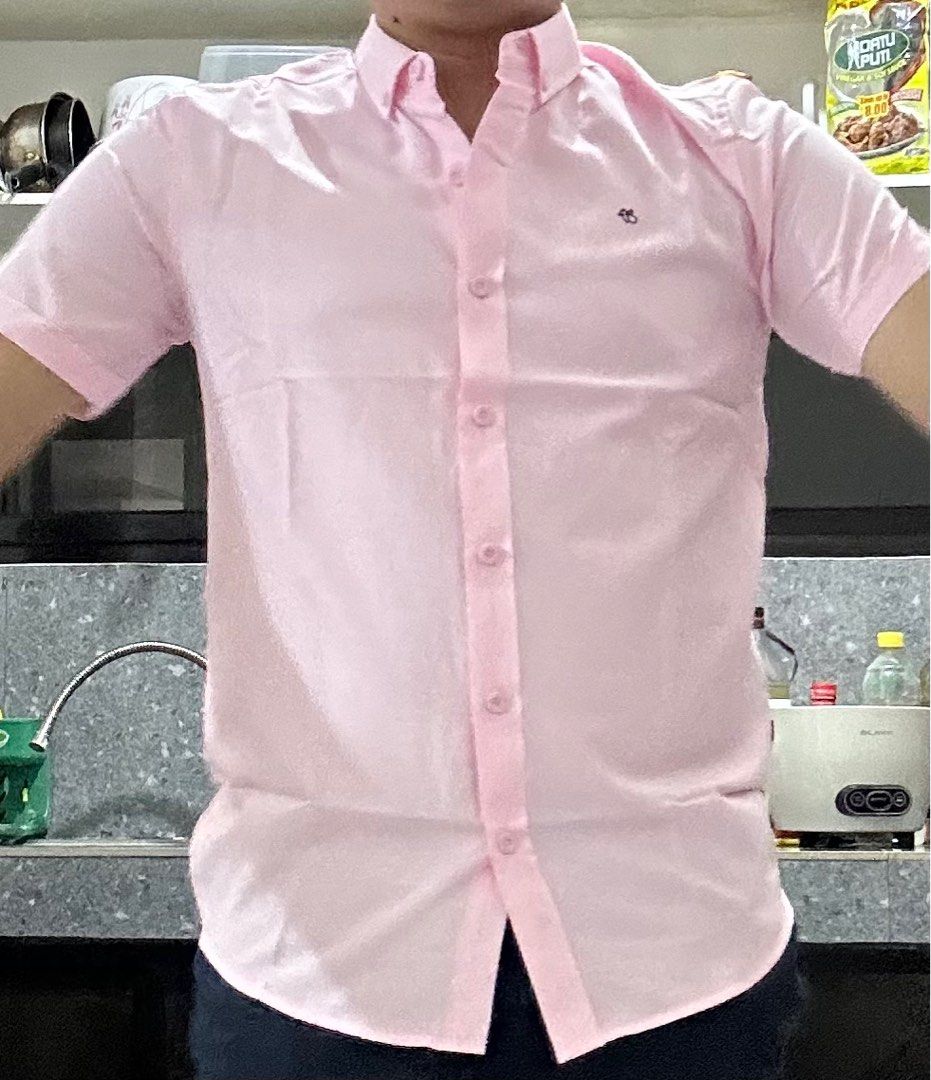 Fubu Woven Short Sleeve Polo (Category: Formal Shirts) located in Bocaue. Submitted by mhonluigo (Listing ID 1264389139, Image 2). Description: Fubu Woven Short sleeve Polo Brand New. RFS - Wrong Size. Fitted sa arm hole. Flex na flex ang biceps. L-27 W-20.