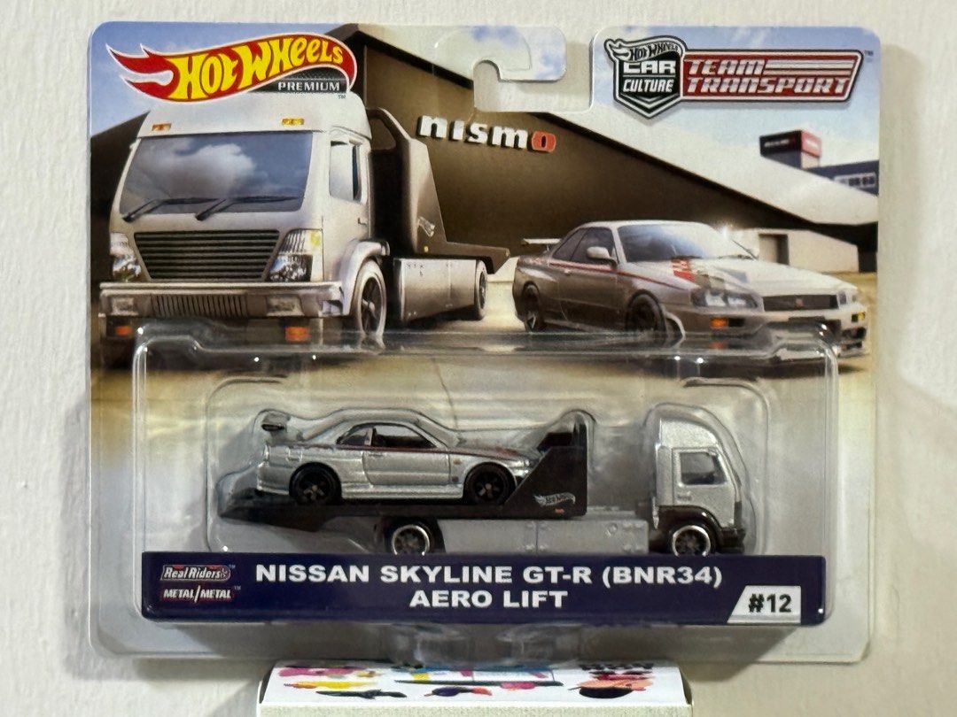 Hot Wheels - Transporter R34 Aero Lift + Nissan Skyline GTR (Category: Vehicle & Diecast Models) located in Singapore. Submitted by pohteck1 (Listing ID 1264389075, Image 1). Description: Brand New Box Condition: minor imperfection (discount given) Quantity: 2.