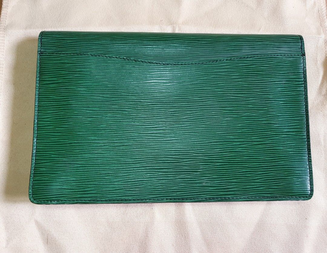 Louis Vuitton Clutch Bag (Category: Luxury Bags & Wallets) located in Manila. Submitted by mybrandshop (Listing ID 1264358632, Image 3). Description: Louis Vuitton Epi Montsigne Leather Clutch Bag Authentic with Date code color: Green with minimal flaws (di lahata pag suot, see photos) last price posted.