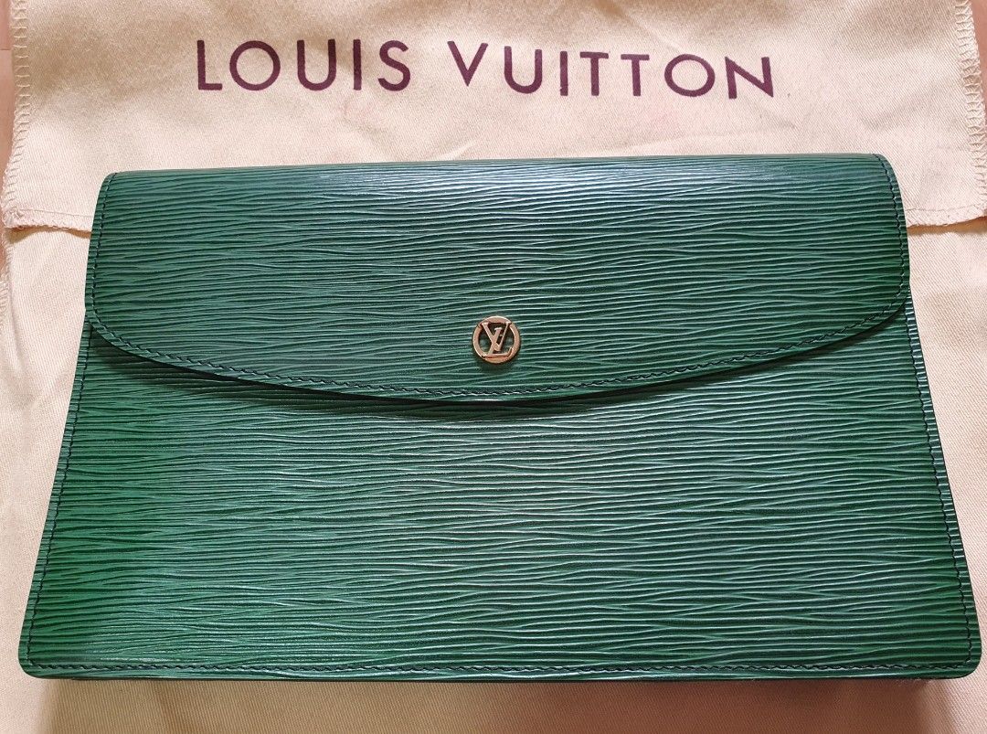 Louis Vuitton Clutch Bag (Category: Luxury Bags & Wallets) located in Manila. Submitted by mybrandshop (Listing ID 1264358632, Image 1). Description: Louis Vuitton Epi Montsigne Leather Clutch Bag Authentic with Date code color: Green with minimal flaws (di lahata pag suot, see photos) last price posted.