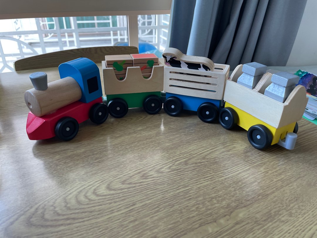 Melissa and doug farm train hot sale
