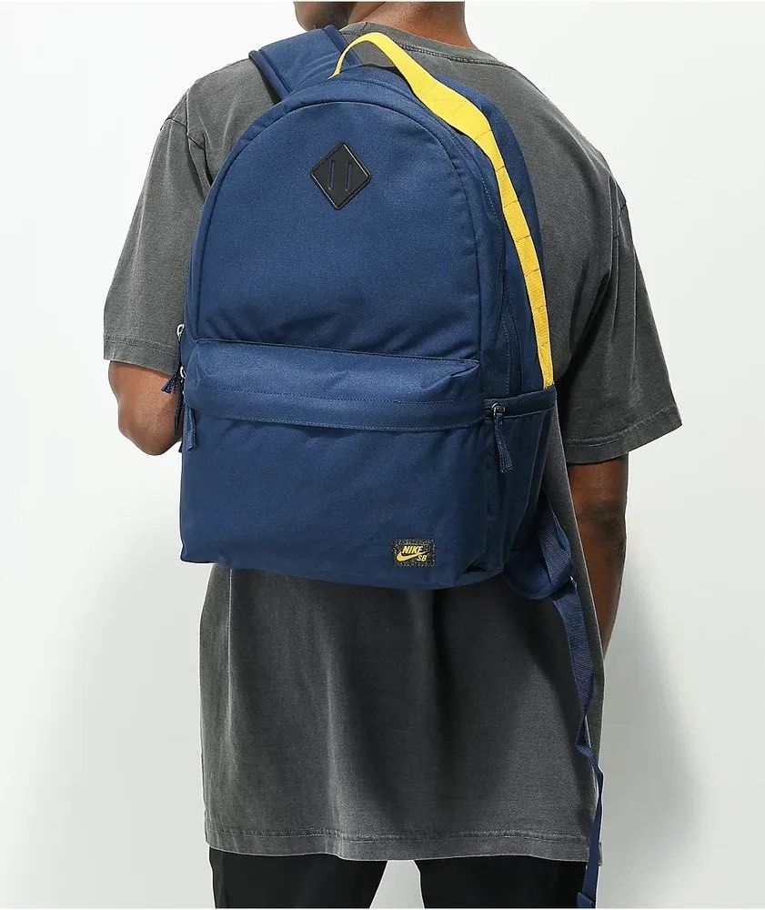 Nike sb icon navy blue backpack bag bagpack (Category: Backpacks) located in Cavite. Submitted by highkeyapparels (Listing ID 1264311832, Image 1). Description: The Nike SB Icon navy blue backpack is devoid of nonsense; it's minimalistic and stylish! Featured in a navy blue colorway, accented by striking yellow detailing around the perimeter, this pack is sure to standout, while the Nike SB logo on the left-hand side of the front pocket adds in s