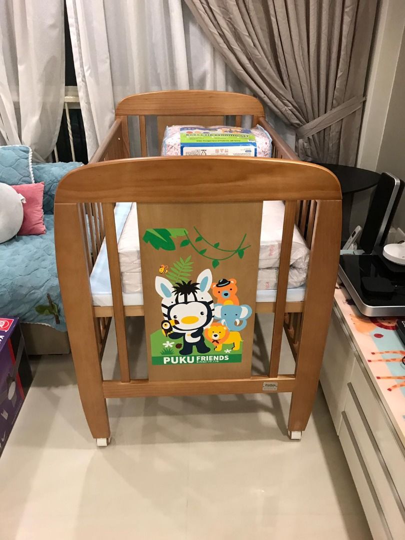 Puku baby deals cot