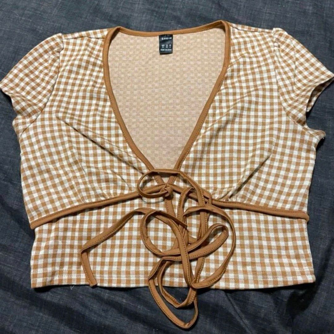 Brown Gingham Crop Top (Category: Shirts) located in Makati City. Submitted by bilzer (Listing ID 1264603522, Image 2). Description: Size XS Deep neckline Good quality Dainty Coquette.