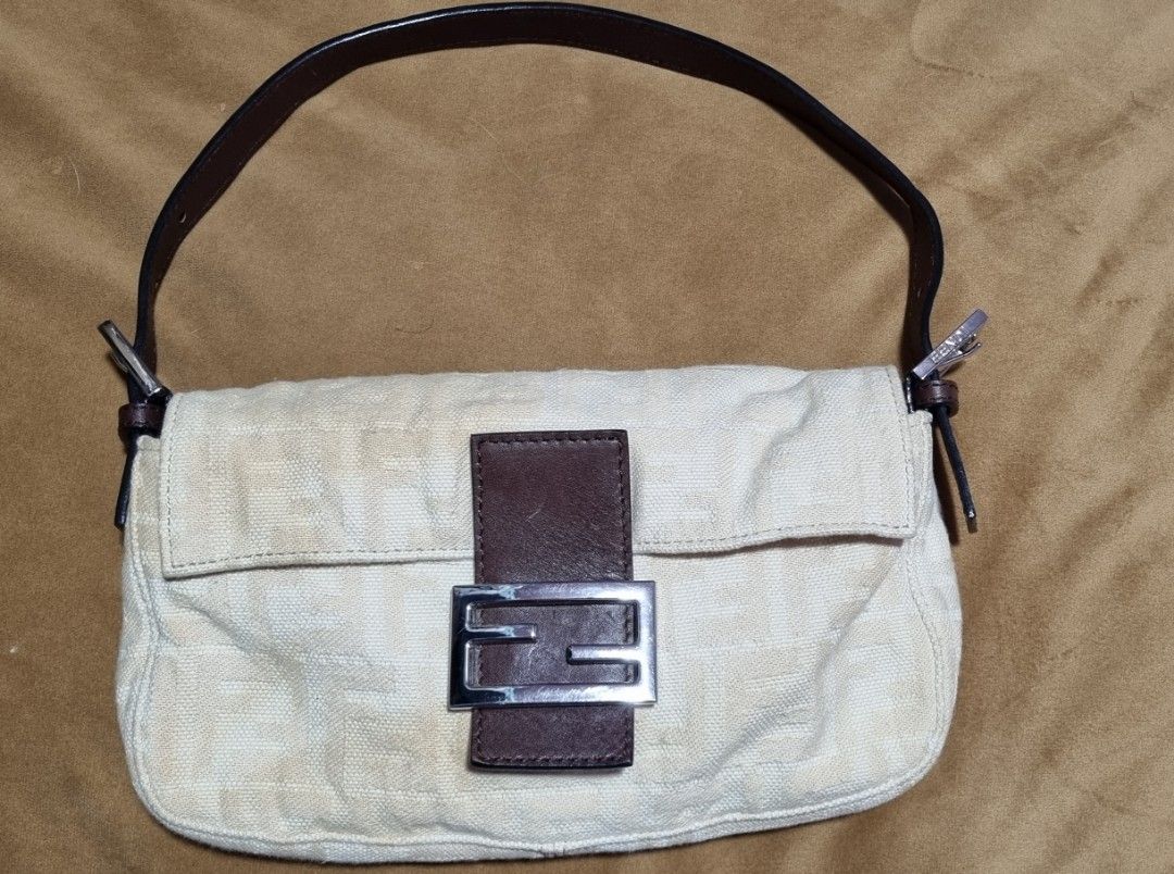 Fendi Mamma Baguette in Beige (Category: Luxury Bags & Wallets) located in Talisay. Submitted by parchiracollection (Listing ID 1264474044, Image 1). Description: ❣️❣️❣️PAKIBASA PO❣️❣️❣️ *with Fendi dust bag *LAST PRICE na po ito *Japan surplus ukay; KAYO NA MAG SELF AUTHENTICATE * Canvas needs bag spa *Once shipped, NO RETURN, NO EXCHANGE *plus SF * This is a second-hand item, kaya wag po mag expect na BAGO *no to low ballers. The discounted pri