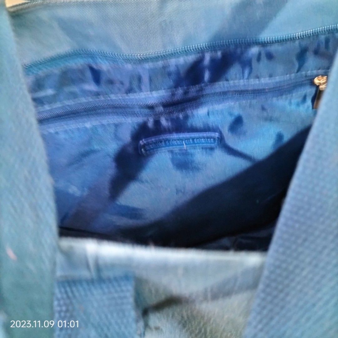 Marithe Francois Girbaud Big Blue Tote (Category: Tote Bags) located in Baguio. Submitted by livewless (Listing ID 1264605597, Image 3). Description: nice blue tote bag. 13.5" wide and 14.5" tall and 4" sides and bottom. zippered Tote. with inside and back pockets. Slight fading on sides. See exterior flaws in photos. Interior is like new. #2024declutter.