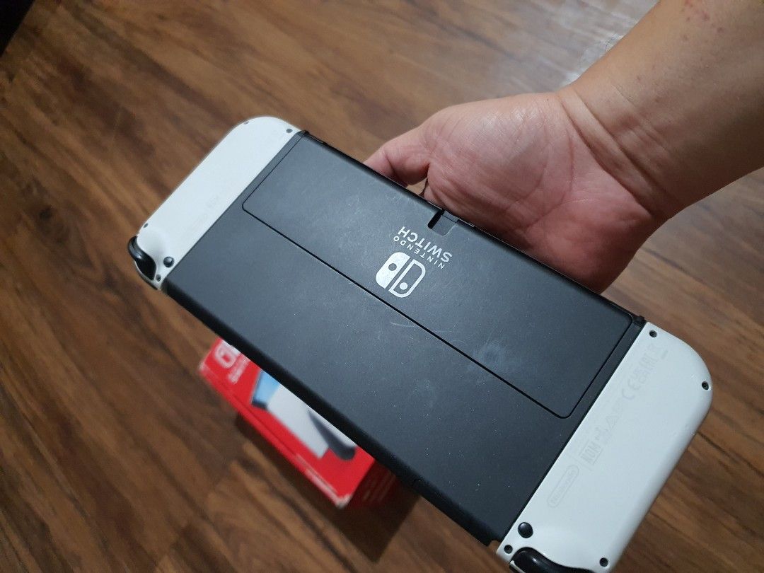 Nintendo switch OLED complete set with aaa games like luigis mansion 7