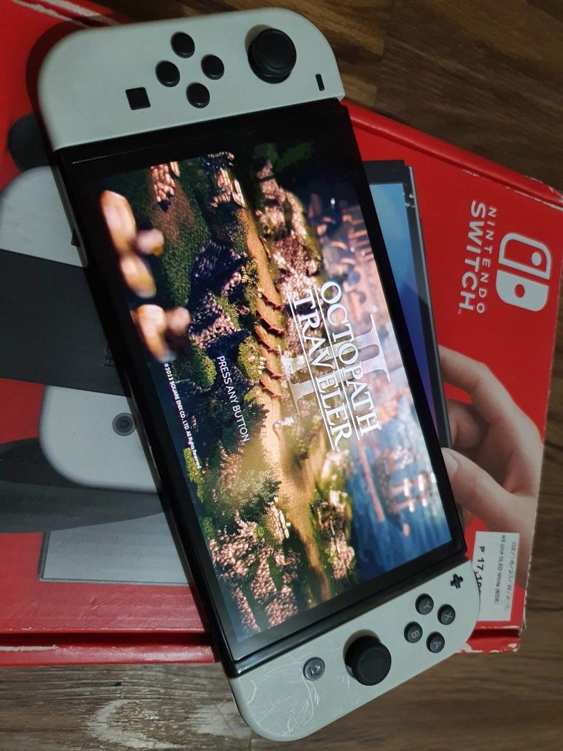 Nintendo switch OLED complete set with aaa games like luigis mansion 7