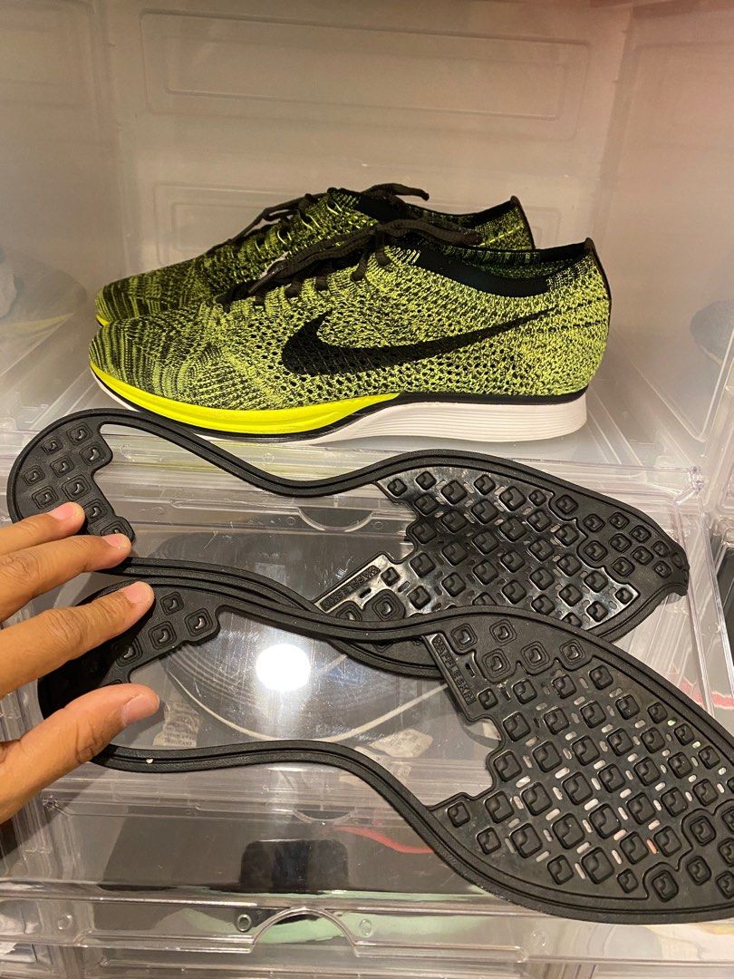 Nike flyknit online racer black gold