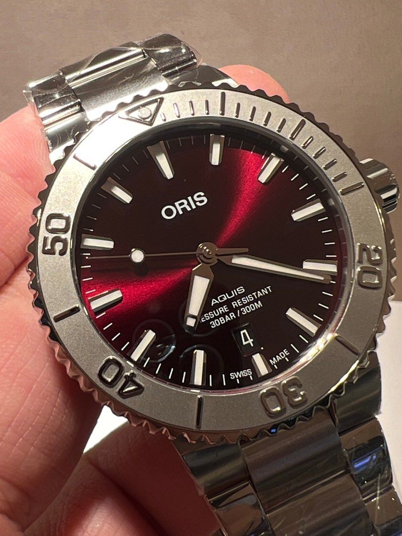 Oris (Category: Watches) located in Petaling Jaya. Submitted by ticktockmagic143 (Listing ID 1264476544, Image 1). Description: Aquis Date Cherry.