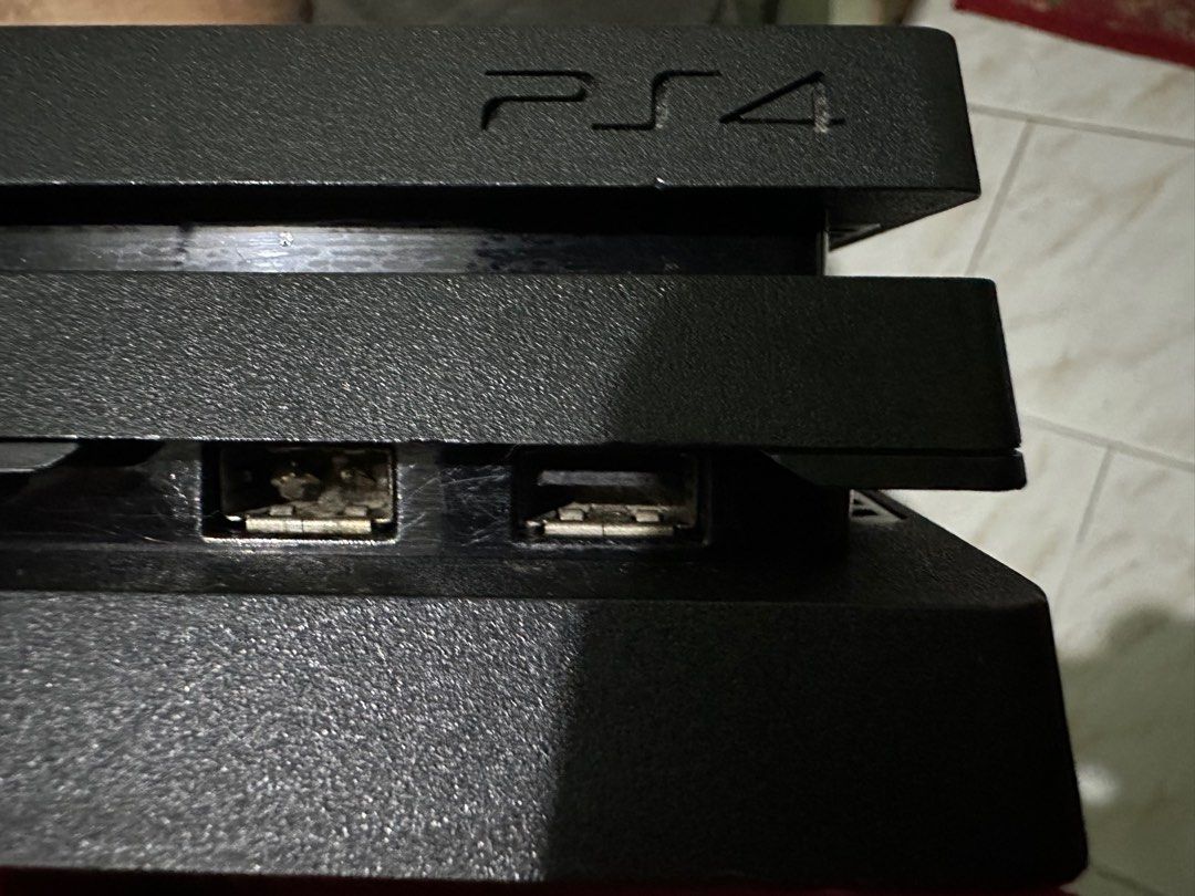 PS4 Pro 500gb (Category: PlayStation) located in Malolos. Submitted by gbbryan (Listing ID 1264465731, Image 2). Description: FW 10.01 Left USB port not working Includes two games, hdmi cable, power cord Controller not available anymore Meetup around recto, legarda.