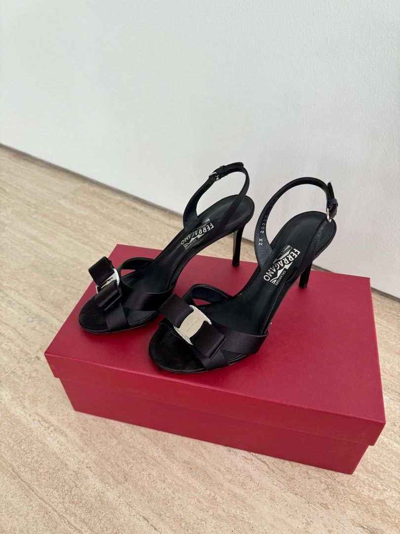 Salvatore Ferragamo heels (Category: Heels) located in Singapore. Submitted by kukubrains (Listing ID 1264529429, Image 3). Description: Used a few times Size US 5.5 Satin/leather material Heel height 7.5cm Comes with box, dustbag, extra heel tips Can provide receipt for verification Purchased for S$1190 from MBS Buyer to self collect from my place or arrange courier .