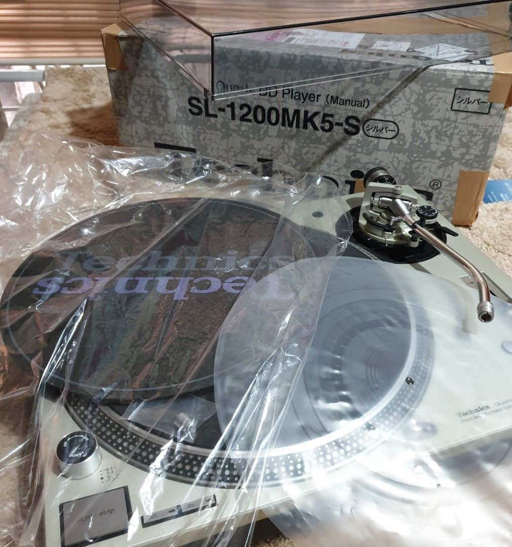 Technics SL-1200MK5 With Box (Category: Soundbars, Speakers & Amplifiers) located in Manila. Submitted by racz03 (Listing ID 1264616704, Image 1). Description: New Arrival Technics SL-1200MK5 Excellent & Presentable Condition, With Slipmat, Rubbermat, Plastic Mat, Auxiliary Weight, Dust Cover & Box. Power Input. 100V.