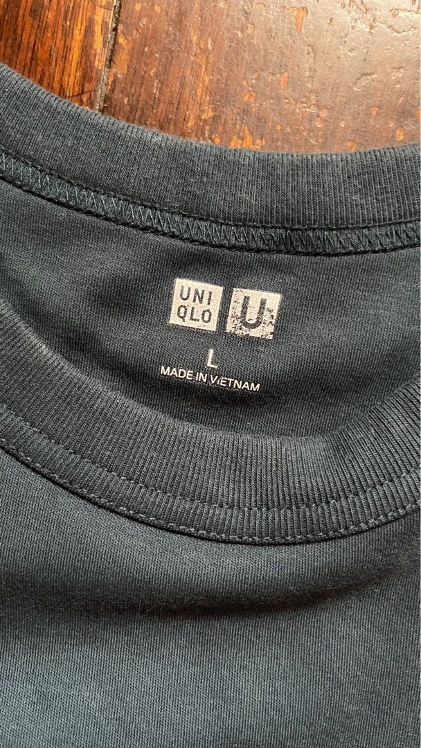 Uniqlo Tee (Category: Shirts) located in Quezon City. Submitted by _pbmt (Listing ID 1264497519, Image 2). Description: Not pictured well but the color is a dark blue-green 18 x 23.5 shoulders: 14.5 sleeves: 6 Strictly no meet-ups MOPs: BPI/Gcash/Maya.