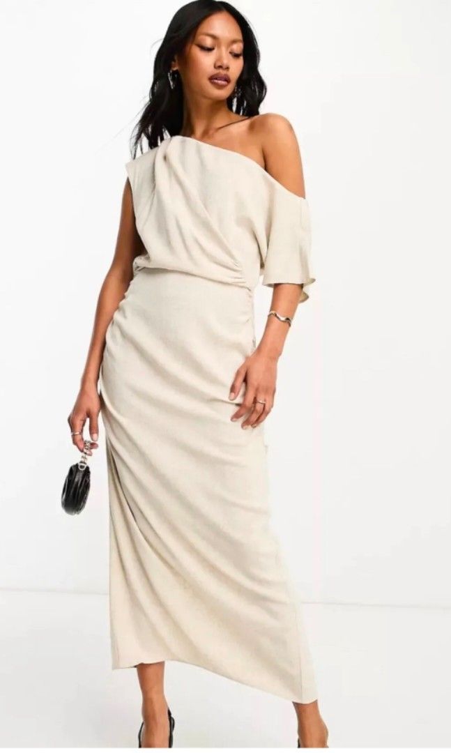ASOS Design Fallen shoulder midi dress (Category: Dresses) located in Malabon City. Submitted by luckyfive (Listing ID 1264668558, Image 3). Description: ASOS Design Fallen shoulder with ruched back, midi dress, color in oatmeal linen, BNWT attached I'm so in love with this dress, sadly it's loose on me, Labelled UK 10, fits M- SL more items listed everyday discount on multiple purchase follow me and get extra 5% discount, 10% to repeat customer.
